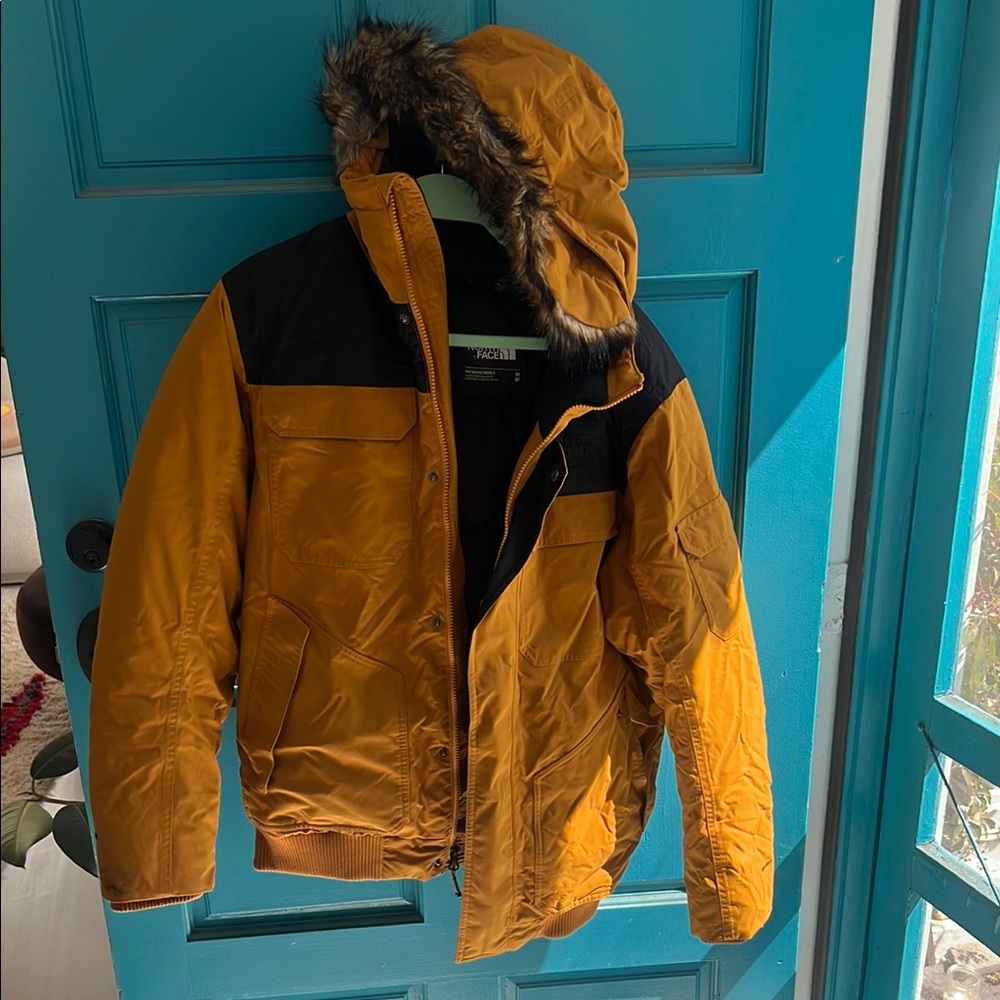 The North Face Yellow and Black Hooded Jacket with Fur Trim
Men's size M